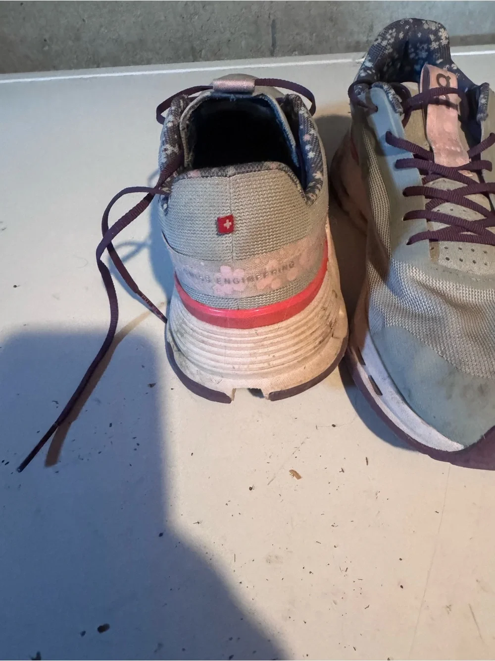 On Running Mint Green and Pink Women’s Athletic Sneakers with Purple Laces